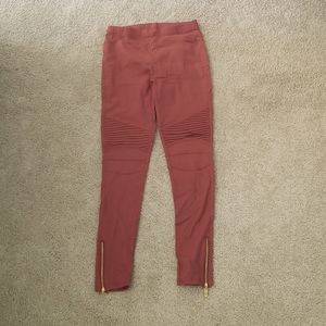 Reddish rust color moto jeggings